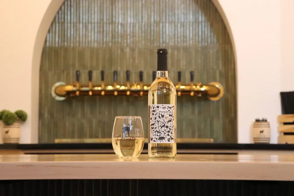 Bar shelf display featuring an amber spirits bottle at Madison Public Market