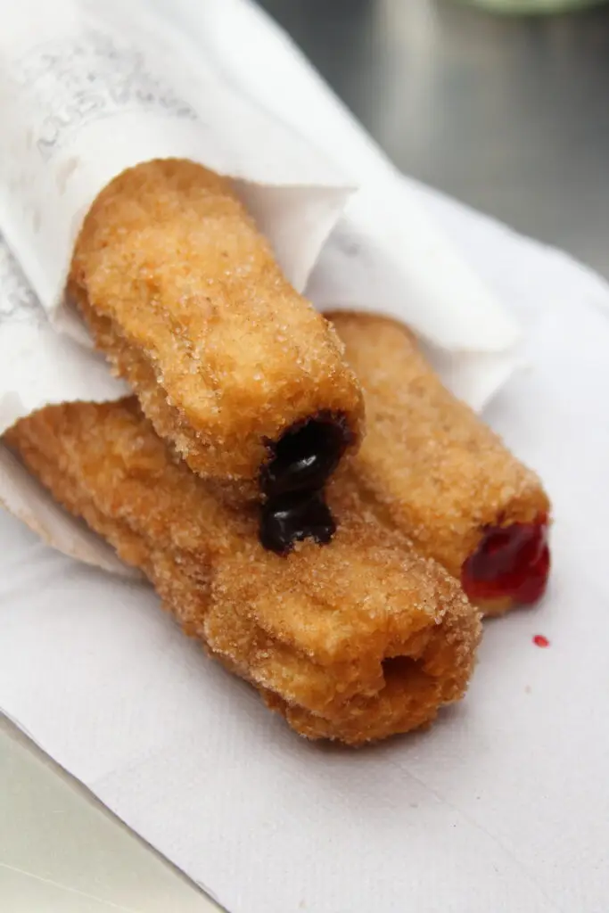 Bundle of churros served on a napkin